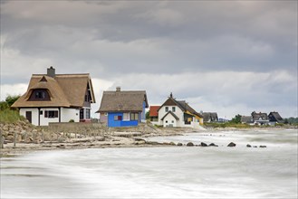 Beach houses along the Baltic Sea on the peninsula Graswarder