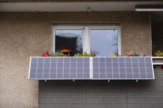Balcony power plant made of solar panels on a house in Duesseldorf