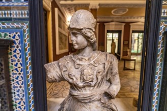 Statue in the courtyard of the Palacio de la Condesa de Lebrija Palace and Museum in Seville