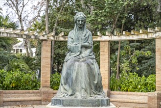 Bronze statue of Princess Luisa Fernanda by Enrique Perez Comendador in Maria Luisa Park