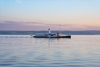 Steamboat in the evening light on Lake Constance near Meersburg