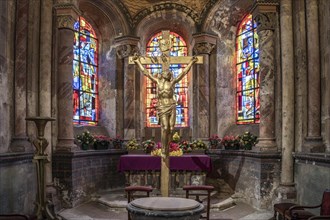 Crucifix in the interior of a chapel of the church Saint-Nicolas