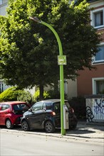 A car loads at a lamppost in Dortmund