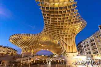 The futuristic wooden construction and observation deck Metropol Parasol at the Plaza de la Encarnacion at dusk