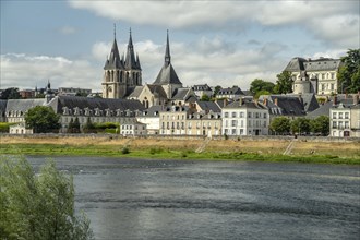 City view with the church Saint-Nicolas and the Loire in Blois