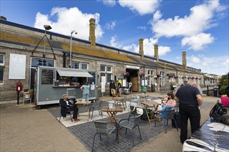 Railway station with street cafe in Penzance