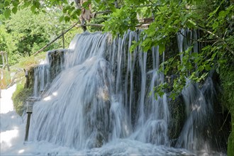 Waterfall at the old mill Kristijan on the Krka stream in the Krka National Park in Northern Dalmatia.Sibenik-Knin
