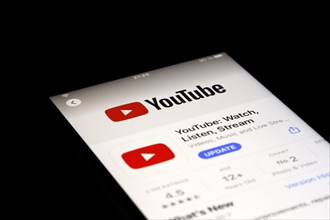 Detailed view of a smartphone with Youtube app in the iPhone App Store