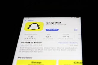 Detailed view of a smartphone with Snapchat app in the iPhone App Store