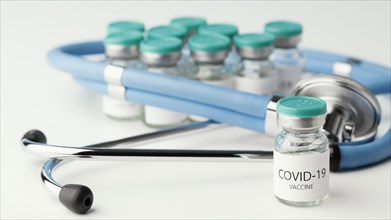 Assortment with coronavirus vaccine bottle