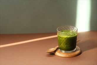 High angle green smoothie glass