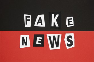 Fake news concept black red