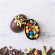 Close up egg with candies bow