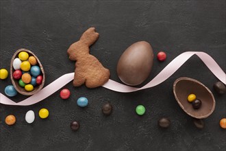 Chocolate egg easter bunny shaped cookie with candy