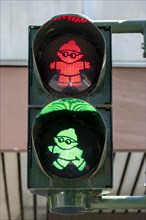 Red Mainzelmaennchen traffic light for standing and green Mainzelmaennchen traffic light for walking