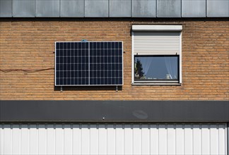 Balcony power plant Solar panel on a facade of a house in Duesseldorf