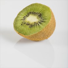 Close up fresh kiwi fruits white surface