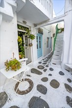 Cycladic white houses with colourful doors and shutters