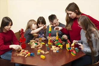 Children with down syndrome playing with toys
