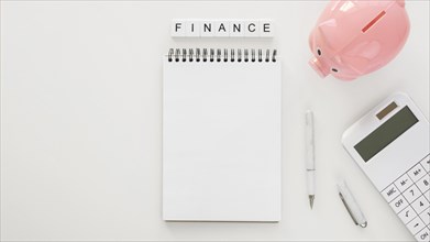 Financial elements arrangement with empty notepad