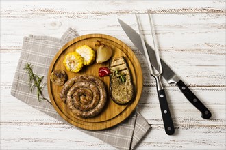 Beautiful serving garnished grilled spiral sausages