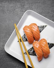 Flat lay tasty sushi plate