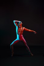 Male ballet dancer leotard with suspenders spotlight
