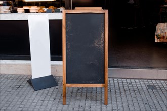 Blank blackboard menu white billboard front restaurant street