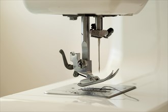 Front view sewing machine with needle