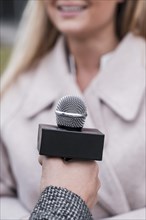 Close up journalist microphone
