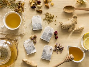 Flat lay natural medicinal herbs with tea