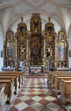 Altar in the pilgrimage church Maria Himmelfahrt in Sammarei