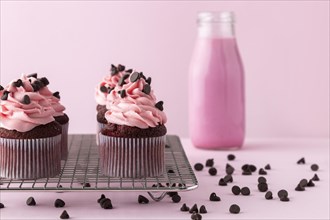 Cupcakes with pink icing pink drink