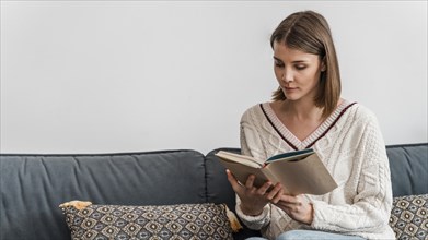 Portrait woman reading book