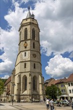 Protestant town church with blue sky and white clouds