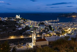 View of the illuminated town of Ermoupoli with Anastasi Church or Church of the Resurrection