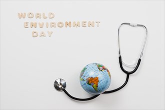 Earth stethoscope text world environment day
