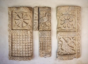 Ancient fragments of sculptures in the Grado Lapidarium