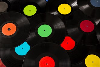 Many colorful black vinyl records