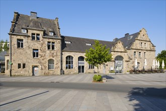 Railway station with public library and restaurant