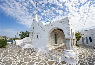 White Greek Orthodox Church Holy Church of Agios Konstantinos with Greek flag