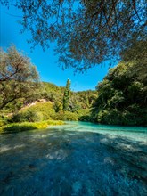 Cold waters of the river of The Blue Eye or Syri i kalter in the mountains of southern Albania