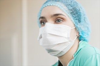 Low angle nurse with mask hospital