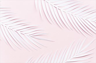 Three paper palm leaves pink table