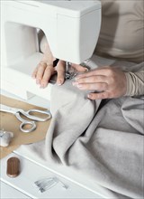 High angle seamstress using sewing machine