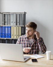 Man office with laptop