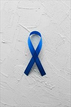 Blue ribbon plaster background