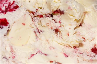 Extreme close up ice cream with vanilla strawberries