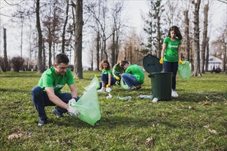 Group volunteers collecting garbage