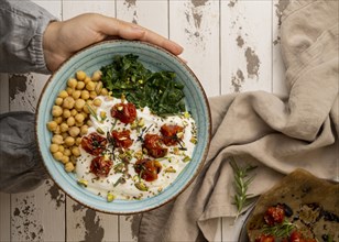 Delicious yougurt meal with chickpeas dried tomatoes